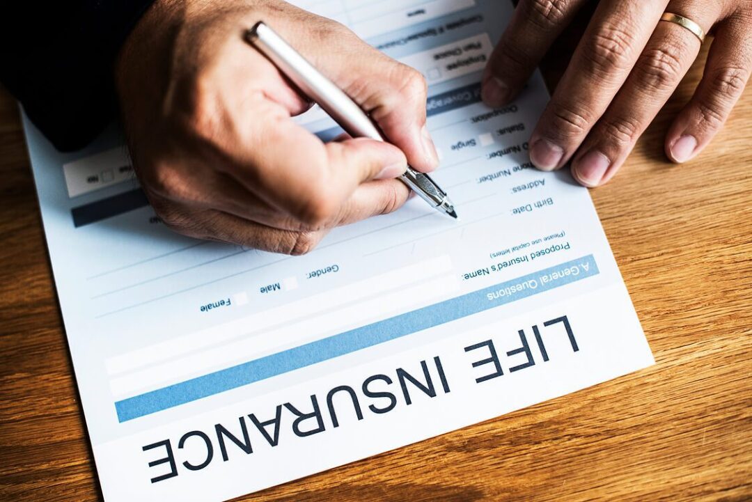 Filling out life insurance paperwork