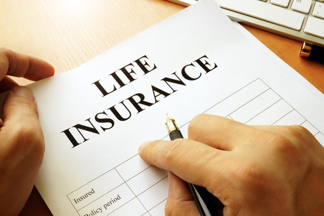 Life insurance document being filled out