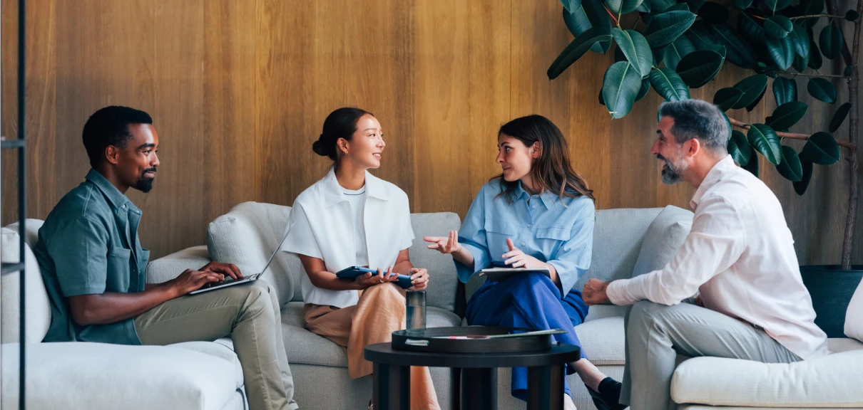 Team discussing ideas in a cozy setting